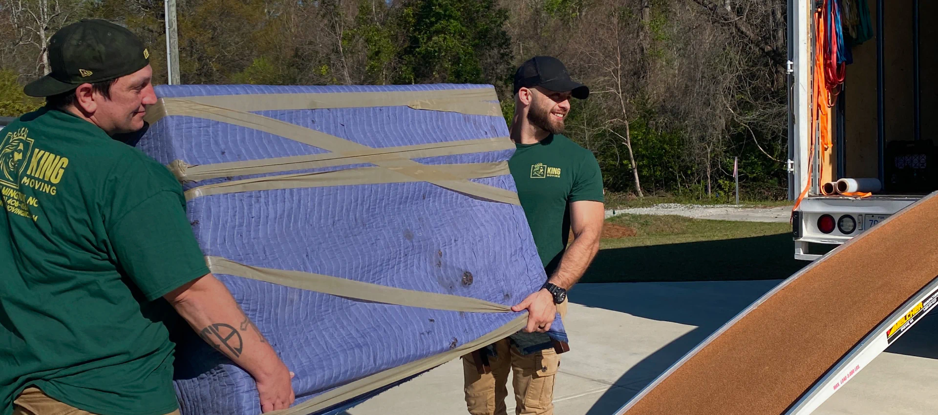 movers with a furniture during a moving
